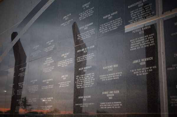 Commemorative wall featuring the names claimed to have been killed due to their beliefs